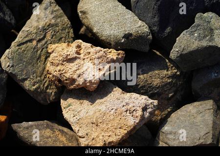 Pietre di mare, ghiaia. Pietra sfondo. Trame. Foto Stock