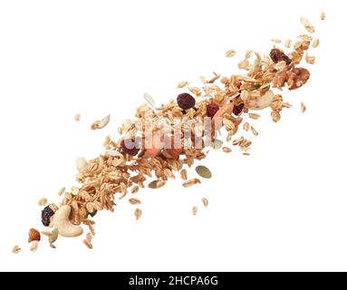 granola spruzzi o gocciolamento isolato su bianco Foto Stock