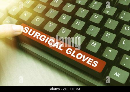 Guanti chirurgici con segnale di ispirazione. Concetto di business per proteggere dall'esposizione a materiali infettivi Abstract Typing Contratto di licenza Foto Stock