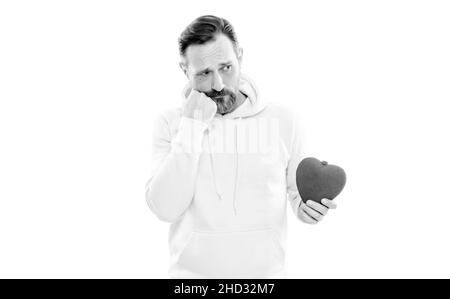 Concetto di giorno e amore di San Valentino. Uomo sicuro e bello in tuta  che tiene bouquet di rose, guardando la macchina fotografica, in piedi su  sfondo bianco Foto stock - Alamy