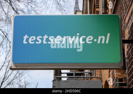 Billboard Testservice.nl Store ad Amsterdam Paesi Bassi 3-1-2021 Foto Stock