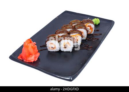 Cucina giapponese - Sushi Roll con gamberi e conger, avocado, Tobiko e formaggio. Sushi roll tempura, cucina giapponese Foto Stock