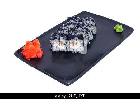 Cucina giapponese - Sushi Roll con gamberi e conger, avocado, Tobiko e formaggio. Sushi roll tempura, cucina giapponese Foto Stock