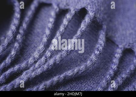 Primo piano dello sfondo viola lavorato a maglia. Foto Stock
