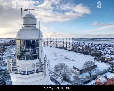 Scena della neve sul faro Foto Stock