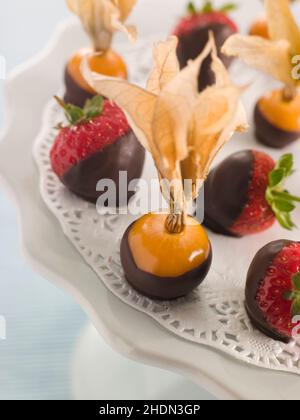 frutta, fragola, physalis, glassa di cioccolato, frutta, fragole Foto Stock