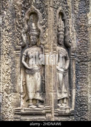 Devatas sul muro del tempio di Ta Prohm - Siem Reap, Cambogia Foto Stock