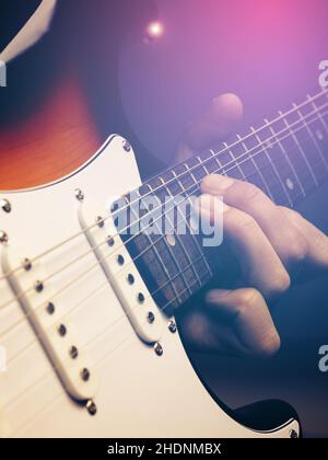 suonare la chitarra, la chitarra, suonare le chitarre Foto Stock