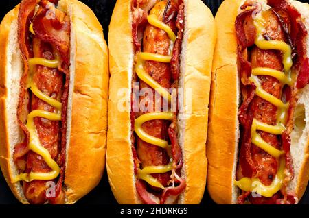 senape, salsiccia, pancetta, mostarde, salsicce, baconi Foto Stock