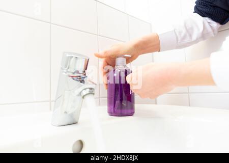 sapone liquido, lavando le mani, disinfettare, saponi liquidi, lavare, lavaggio, disinfezione Foto Stock