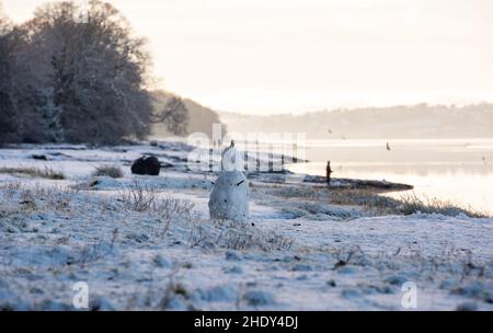 Un mini pupazzo di neve, Arnside, Milnthorpe, Cumbria, Regno Unito Foto Stock