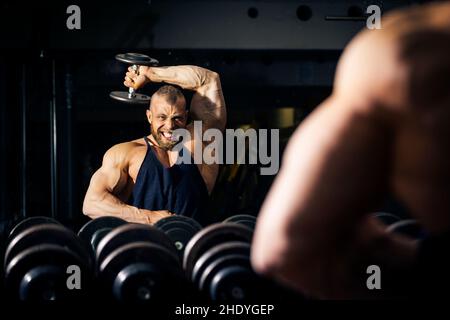 sollevamento pesi, doloroso, allestitore, verniciatura, allestitori, carrozzeria Foto Stock