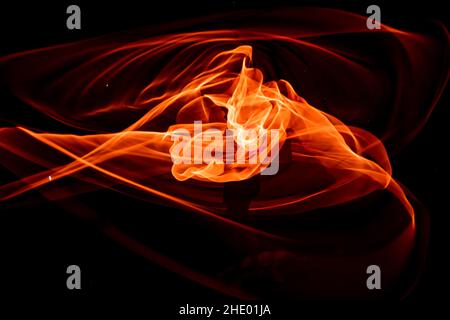 pallone arancione isolato su sfondo nero Foto Stock