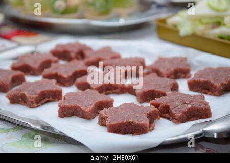 Un mix di antipasti italiani per la cena di Capodanno Foto Stock