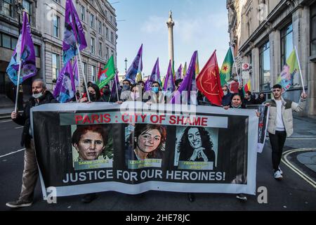 Londra UK 9 gennaio 2022 per memorizzare la triplice uccisione a Parigi, 9 anni fa, di Fidan Dogan, sakine Cansiz e Leyla Saylemez, attivista curdo, presumibilmente a mano dell'Organizzazione nazionale di intelligence della Turchia, I manifestanti hanno marciato a Londra da Trafalgar Square a parliament Square chiedendo giustizia per portare i colpevoli alla giustizia, nessuno è stato accusato degli omicidi .Paul Quezada-Neiman/Alamy Live News Foto Stock