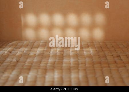 riflessione della luce su texture beige Foto Stock