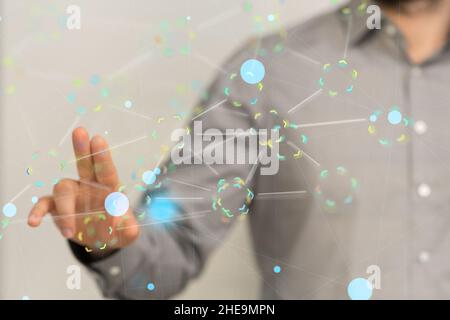 Messa a fuoco superficiale di una pittura a mano umana su schermo d'aria, rete digitale e concetto di dati Foto Stock