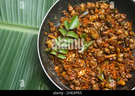 Vongolo di carne fritto kerala stile kakka irachi fry Foto Stock