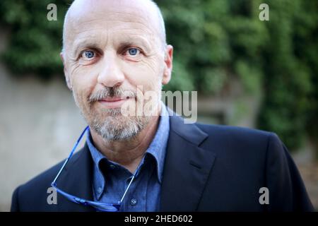 Ritratti di Marco Paolini durante una cena di beneficenza della Fondazione Internazionale di Venezia. Venezia, 25 giugno 2012. Foto Stock