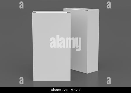 Confezione regalo: Due scatole bianche alte e larghe su sfondo grigio. Visualizza sopra Foto Stock
