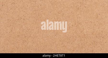 Texture marrone chiaro. Imballaggio in cartone. Pergamena beige, manoscritto. Sfondo ruvido. Superficie naturale di un foglio di carta vecchia Foto Stock