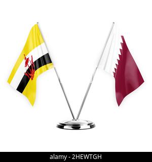 Due bandiere di tabella isolate su sfondo bianco 3D illustrazione, brunei e qatar Foto Stock
