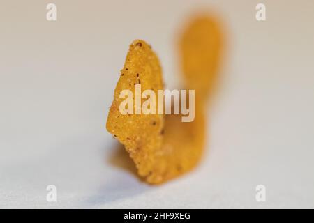 Primo piano della scheggiatura di frito di mais ricci. Foto di alta qualità Foto Stock