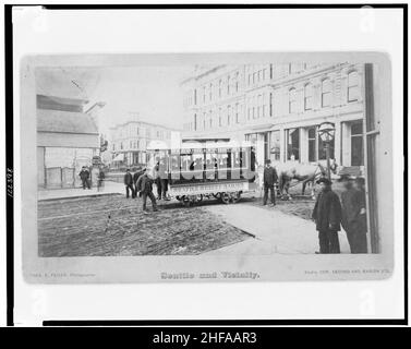 Prima strada di Seattle che gira da Occidental Avenue a Yesler Way) - Theo. E. Peiser, fotografo Foto Stock