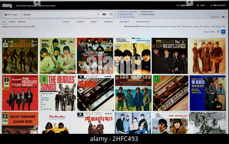 Screenshot del computer del Alamy.com che mostra le fotografie dei Beatles disponibili per l'acquisto tramite l'agenzia fotografica di riserva Alamy a Londra, Inghilterra. Foto Stock