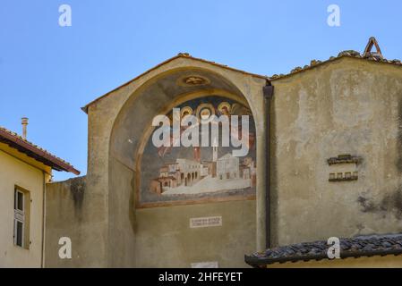 PIENZA, TOSCANA, ITALIA - MAGGIO 18 : Murale su un muro all'ingresso di Pienza il 18 Maggio 2013 Foto Stock