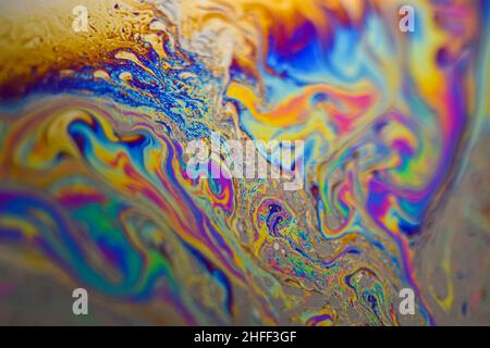 Superficie psichedelica multicolore colorata vibrante di bobble di sapone primo piano Foto Stock