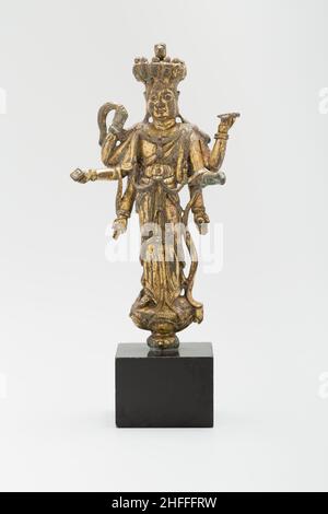 Guanyin a undici teste e sei armi (Avalokiteshvara) in piedi su un loto, dinastia Tang (618-907), c.. 9th secolo. Foto Stock