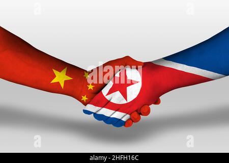 Stretta di mano tra la corea del Nord e la cina bandiere dipinte sulle mani, illustrazione con percorso di clipping. Foto Stock