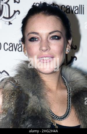 Lindsay Lohan partecipa all'afterparty di Roberto cavalli dopo la sfilata di moda alla settimana della moda di Milano. Foto Stock