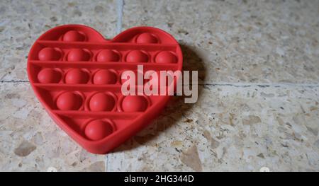 Colorful Push Pop IT Bubble Sensory Fidget Giocattoli di diverse forme, Sensory silicone Giocattoli per l'autismo, Fidget Popper, Anti Ansia e stress Relief G Foto Stock