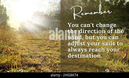 Citazione ispiratrice - non posso cambiare la direzione del vento, ma posso regolare le mie vele per raggiungere sempre la mia destinazione. Con sole luminoso e parco Foto Stock