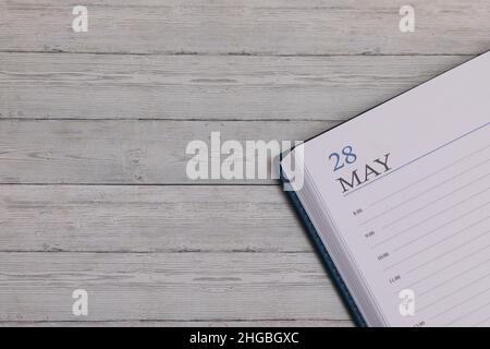 Data esatta nel nuovo diario. Importante evento e spazio per appunti per maggio 28. Foto Stock