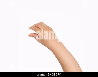 Studio girato di una mano ragazzo appeso qualcosa bianco isolato su uno sfondo bianco Foto Stock