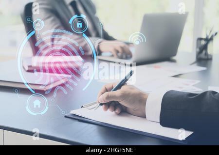 Business people working in office. Concept of fingerprint protection Foto Stock