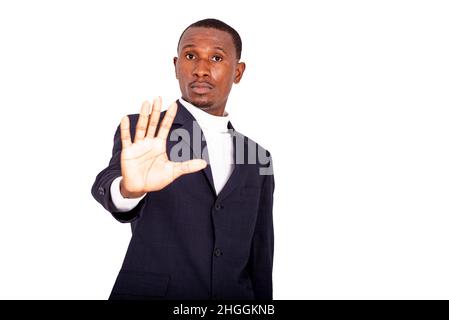 bell'uomo d'affari serio adulto che mostra stop gesture con la palma. Foto Stock
