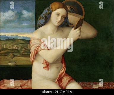 Giovane donna alla sua toilette - 1515 - olio su legno 78,3 x 62,9 cm - Bellini Giovanni Foto Stock