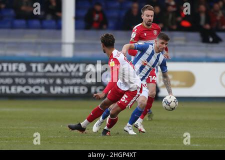 Hartlepool, UK. JAN 22ND Hartlepool United's Gavan Holohan in action with Stevenage's Terence Vancooten during the Sky Bet League 2 match between Hartlepool United and Stevenage at Victoria Park, Hartlepool on Saturday 22nd January 2022. (Credit: Mark Fletcher | MI News) Credit: MI News & Sport /Alamy Live News Stock Photo