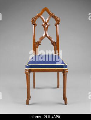 Sedia laterale ca. 1857 disegnata da Alexander Jackson Davis American questa delicata ma animata sedia laterale è un esempio magistrale dello stile Gothic Revival. Ha una parte posteriore splendidamente composta di gambe aperte e snelle che si sprigionano da piedi che assomigliano agli zoccoli di cervo. Davis, uno dei più importanti architetti dell'America del diciannovesimo secolo, lavorò in altri stili di rinascita oltre che in gotica. A volte ha fornito i dettagli interni ed esterni di una casa e, a differenza della maggior parte degli architetti del periodo, Davis anche occasionalmente fornito mobili disegni per selezionare i clienti. Questo warnu Foto Stock
