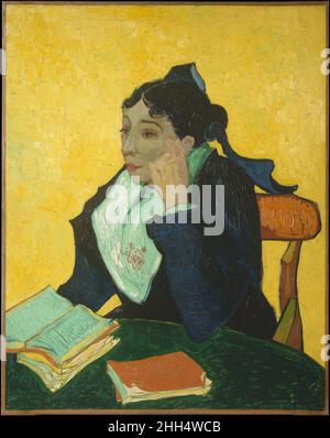 L'Arlésienne: Madame Joseph-Michel Ginoux (Marie Julien, 1848–1911) 1888–89 Vincent van Gogh olandese mentre ad Arles, Van Gogh dipinse due ritratti molto simili di Marie Ginoux, la proprietaria del Café de la Gare, indossando il costume regionale delle leggendarie bellezze dai capelli scuri di Arles. La prima versione, che egli descrisse in una lettera del novembre 1888 come "un Arlésienne.. Bussato in un'ora", deve essere il ritratto più sottile e sommariamente eseguito nel Musée d'Orsay di Parigi. In esso un ombrellone e guanti si trovano sul tavolo invece di libri. Questo ritratto appartenne alla seduta fino a quando lei Foto Stock