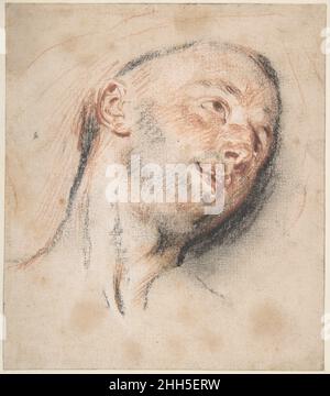 Testa di un uomo ca. 1718 Antoine Watteau French questo foglio espressivo è uno studio per la testa dell'uomo nella pittura di Watteau Mezzetin, anche nella collezione del Museo (34,138). Mezzetin era un personaggio della commedia popolare dell'arte, tipicamente amorosa e sentimentale. Nella pittura del Museo, si siede su una panca di pietra all'esterno di un edificio, suonando una chitarra e guardando in modo chiaro ad una finestra invisibile. L'artista ha posto una statua femminile giardino nei boschi dietro il Mezzetin, la sua schiena rivolta all'attore, suggerendo un amore non riacclamato. In questo robusto studio rosso e nero, Watteau ha stabilito l'angolo Foto Stock