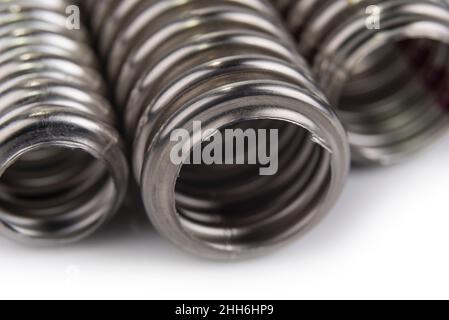 Tubi flessibili in acciaio per una caldaia su un bianco Foto Stock