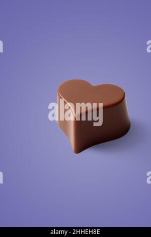 San Valentino lilla sfondo del cuore di cioccolato. Foto Stock