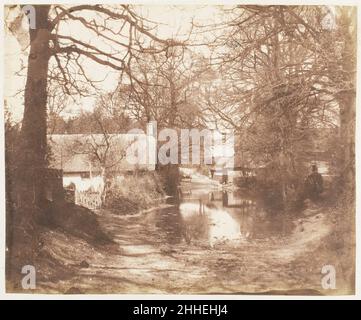 [View of a House in the Woods, with a waterlogged Road] 1853–56 John Dillwyn Llewelyn. [Vista di una casa nel bosco, con una strada navigata] 283076 Foto Stock