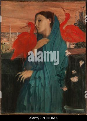 Giovane donna con Ibis 1857-58; rilavorato 1860-62 Edgar Degas francese Degas ha fatto schizzi di questa composizione in un quaderno che ha usato durante il suo secondo soggiorno a Roma nel 1857-58. Originariamente concepita come una rappresentazione di una donna pensiva, l'immagine assunse un'aria misteriosa quando Degas aggiunse l'immaginario paesaggio urbano mediorientale, i fiori rosa e i due stambecchi rossi intorno al 1860-62. Più o meno nello stesso periodo considerò l'aggiunta degli uccelli brillanti al suo grande dipinto storico Semiramis Building Babilonia (Musée d'Orsay, Parigi). Giovane donna con Ibis 438156 Foto Stock