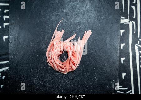 pasta fresca rosa cruda Foto Stock